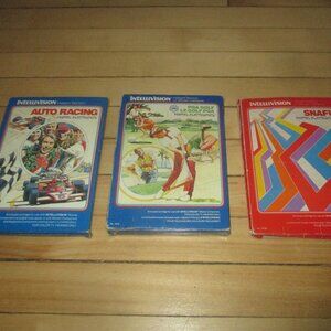 Mixed Lot of 3 Boxed Intellivision Games Auto Racing, PGA Golf and SNAFU)